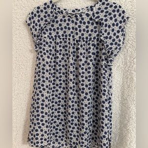 Loft outlet short sleeve top with ruffle detail at shoulders.